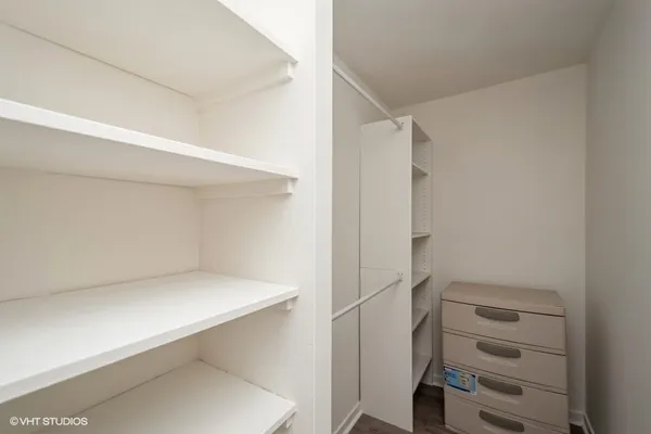 a view of an empty walk in closet