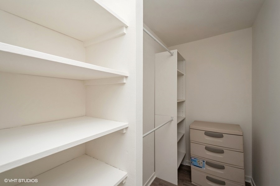 211 East Ohio Street, Unit 2012 Chicago, IL 60611 - Photo 8 of 19 a view of an empty walk in closet
