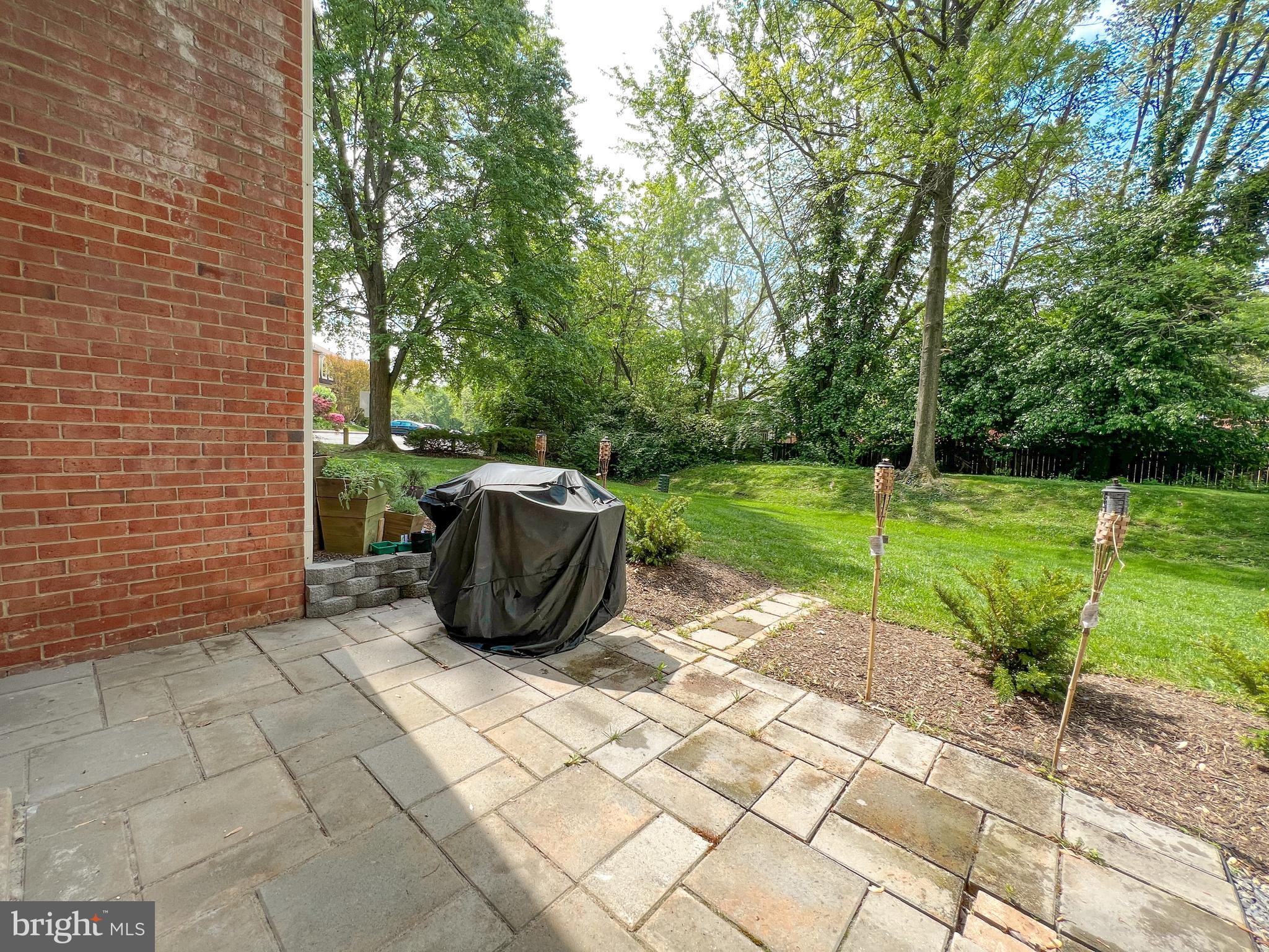 36 Pennydog Court Silver Spring, MD 20902 - Photo 27 of 27 a view of a backyard with a garden and plants
