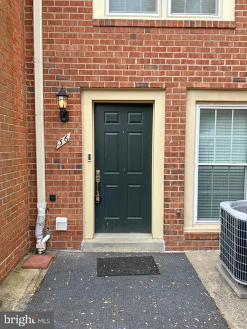 a front view of a building with a glass door