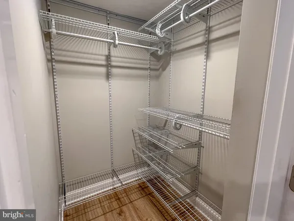 a bathroom with a glass door shower