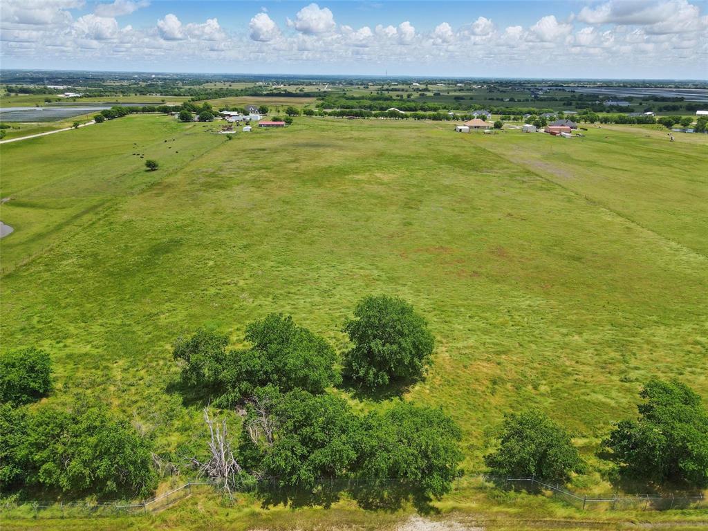 Overview of rural landscape featuring a pastoral area