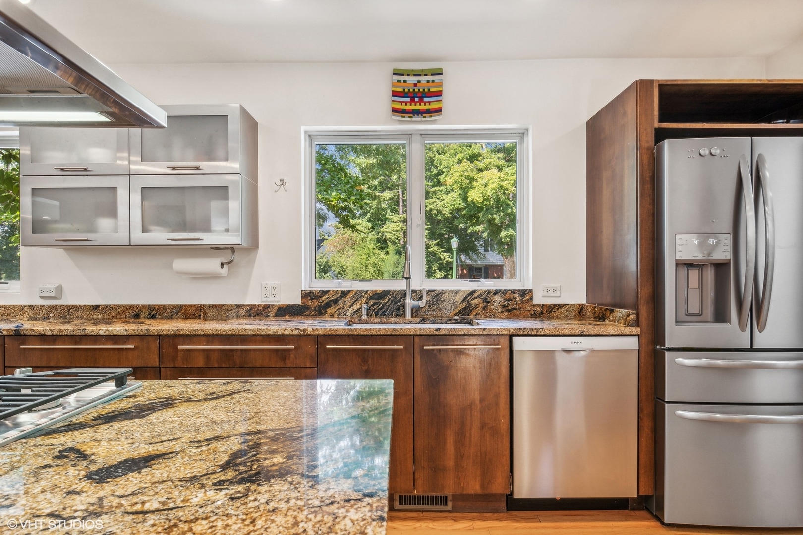2921 Sheridan Road Evanston, IL 60201 - Photo 13 of 38 a kitchen with stainless steel appliances granite countertop a refrigerator and a sink
