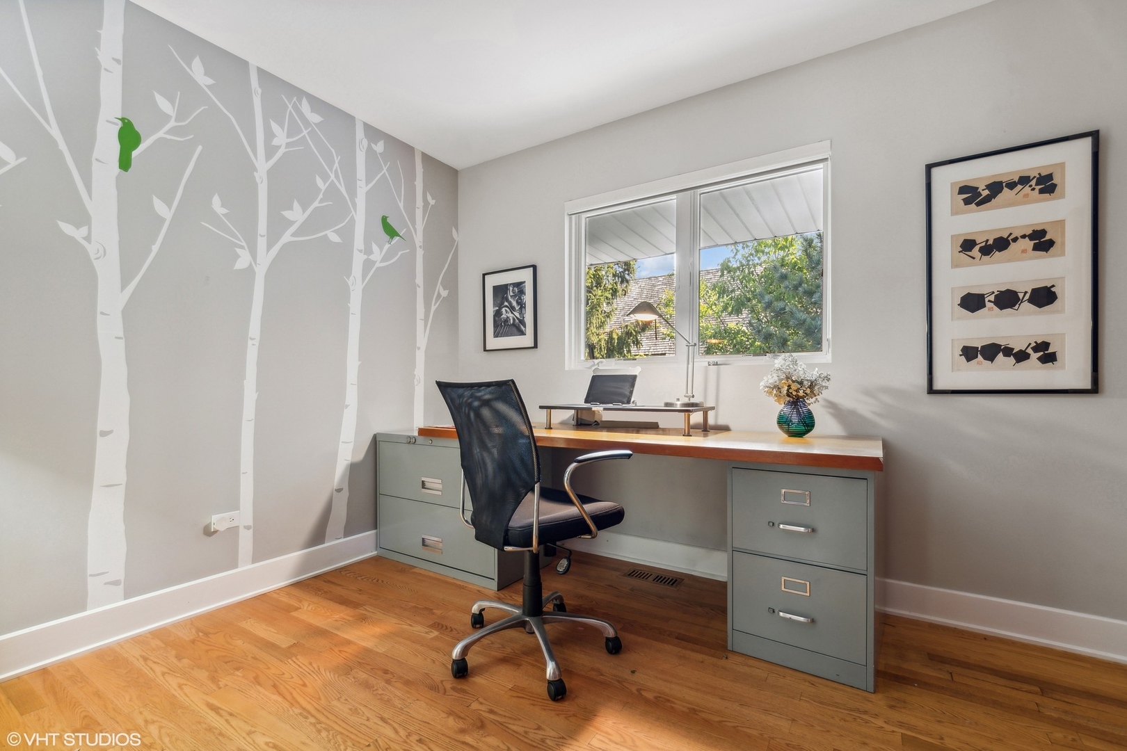 2921 Sheridan Road Evanston, IL 60201 - Photo 23 of 38 a view of a workspace with furniture and a window