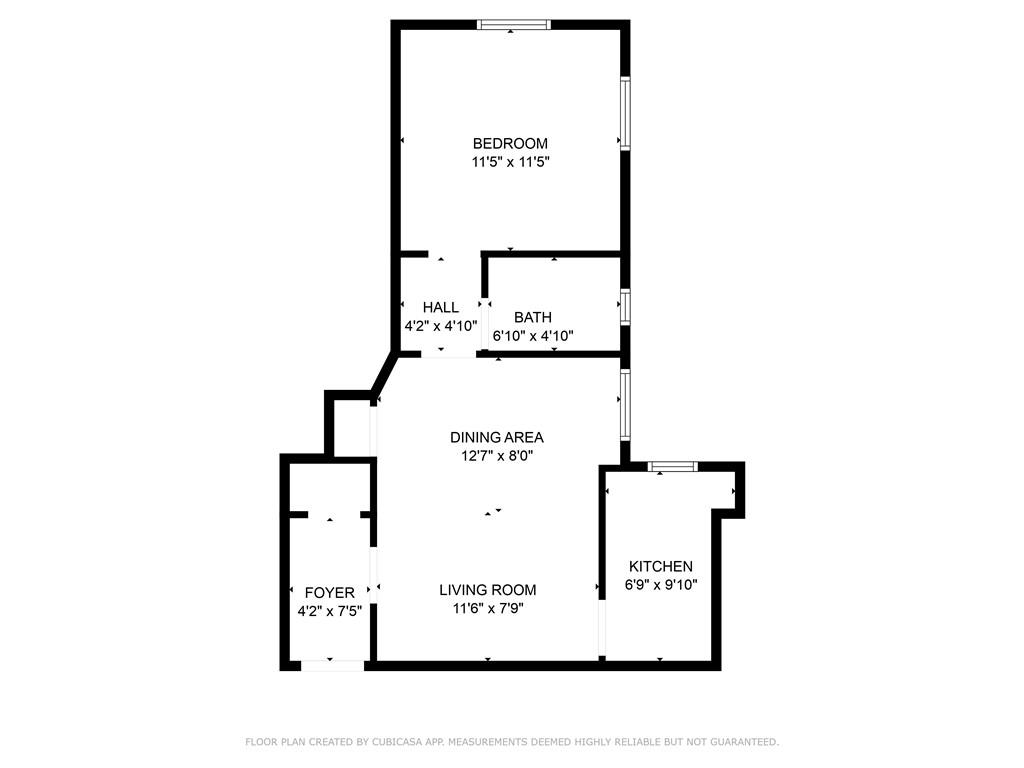 9524 Fort Hamilton Parkway, Unit 601 Brooklyn, NY 11209 - Photo 13 of 13 a picture of a bench in front of a white house