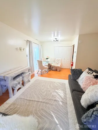 a bed room with a bed and a mirror