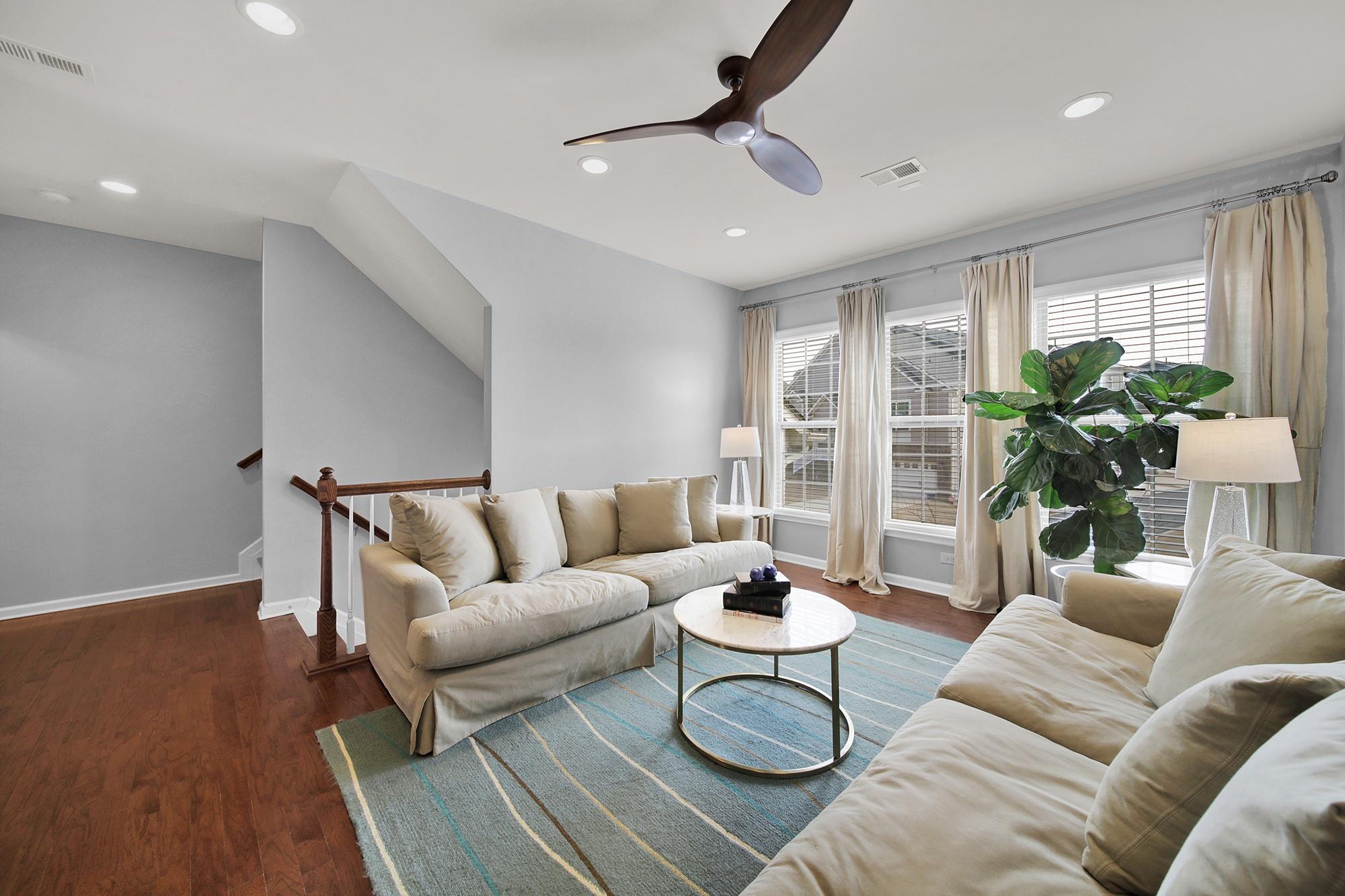 212 Butterfly Place Tega Cay, SC 29708 - Photo 3 of 35 a living room with furniture and a potted plant