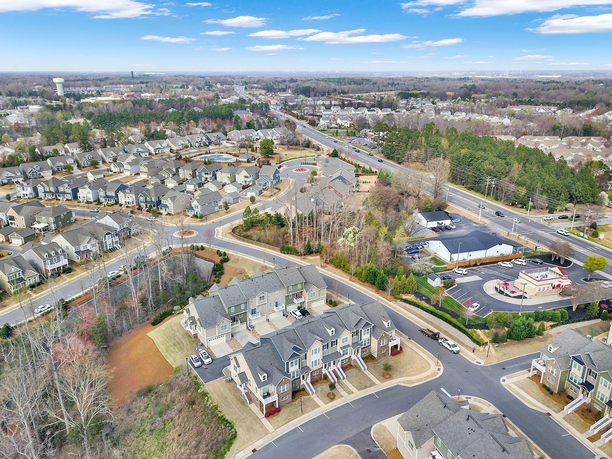 212 Butterfly Place Tega Cay, SC 29708 - Photo 31 of 35 an aerial view of residential houses with outdoor space