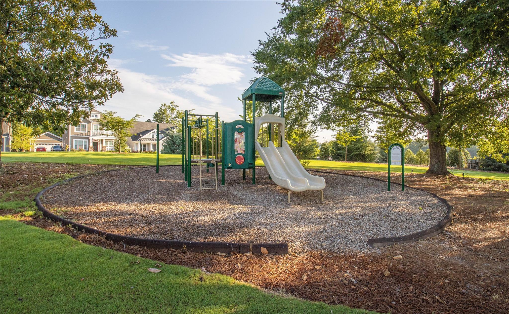 212 Butterfly Place Tega Cay, SC 29708 - Photo 34 of 35 a view of a park with swings