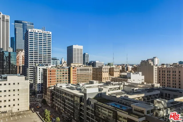 a view of city with tall buildings
