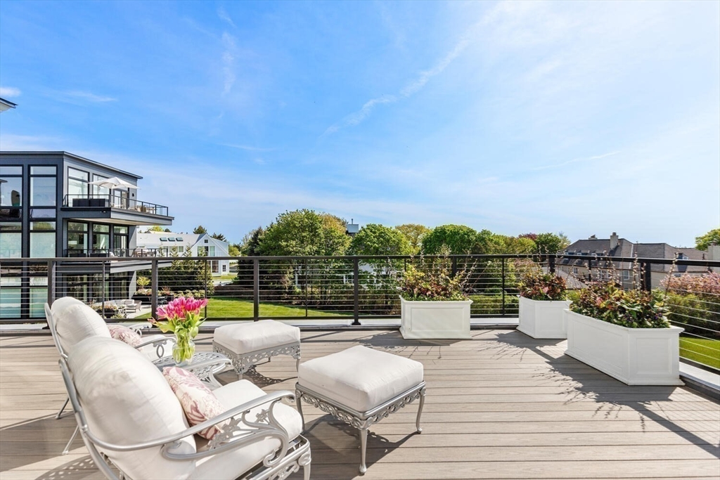 35 Littles Point Road, Unit S201 Swampscott, MA 01907 - Photo 13 of 36 a view of a terrace with seating area and furniture