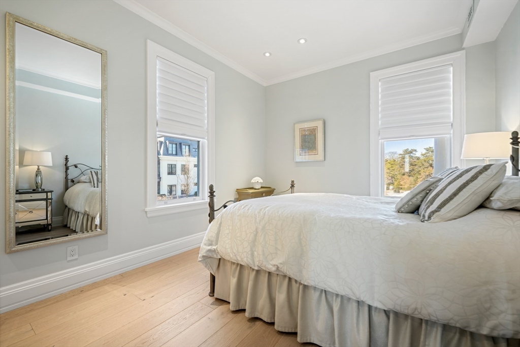 35 Littles Point Road, Unit S201 Swampscott, MA 01907 - Photo 19 of 36 a bedroom with a bed and a large window