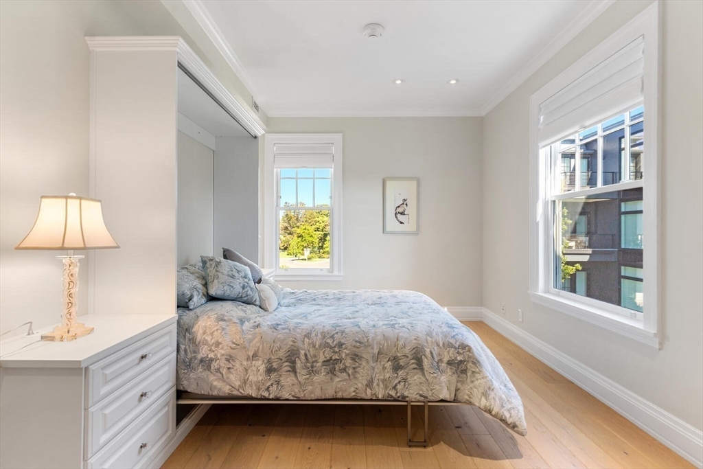 35 Littles Point Road, Unit S201 Swampscott, MA 01907 - Photo 21 of 36 a bedroom with a bed and a window