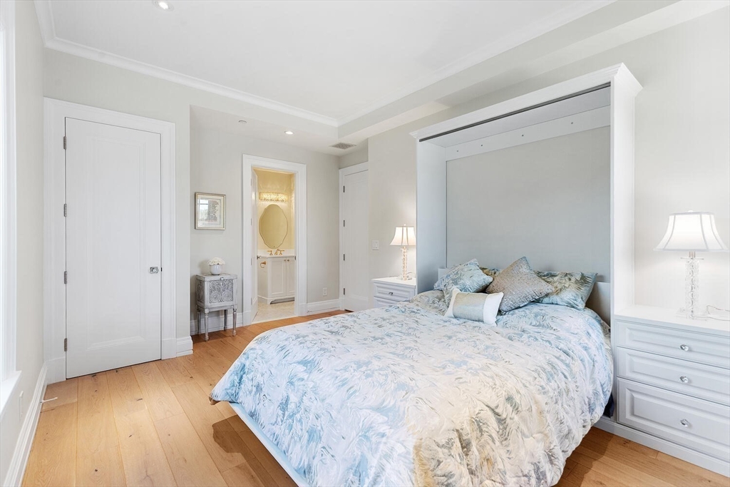 35 Littles Point Road, Unit S201 Swampscott, MA 01907 - Photo 22 of 36 a bedroom with a bed and closet