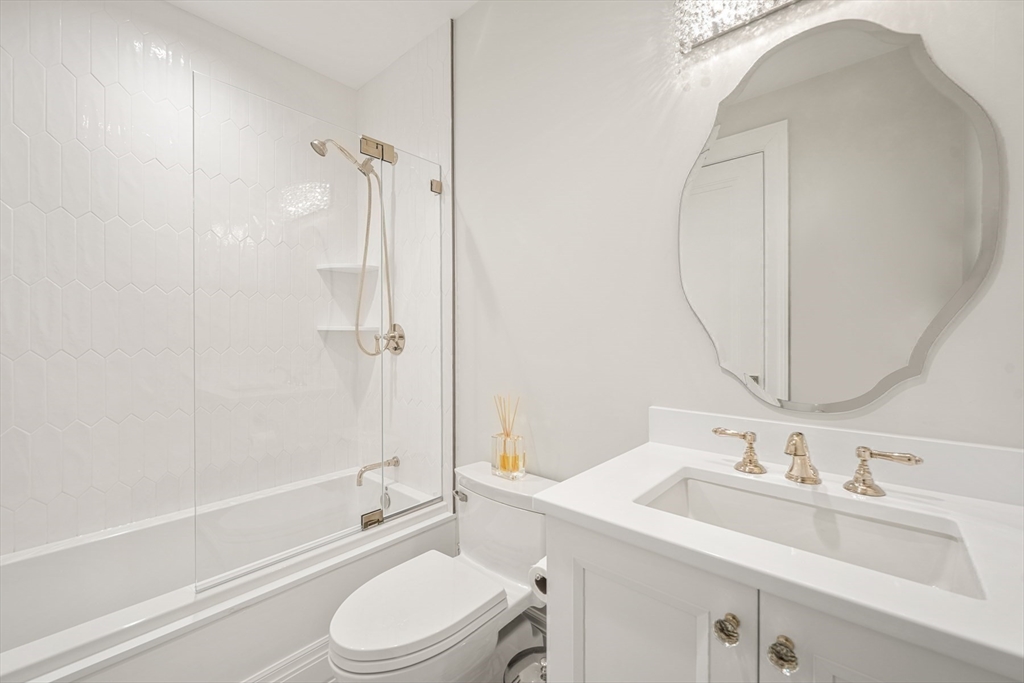 35 Littles Point Road, Unit S201 Swampscott, MA 01907 - Photo 23 of 36 a bathroom with a sink toilet and shower