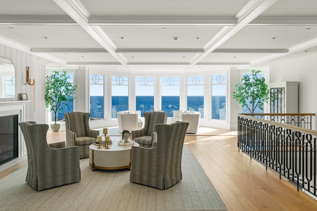 35 Littles Point Road, Unit S201 Swampscott, MA 01907 - Photo 28 of 36 a living room with furniture and a large window