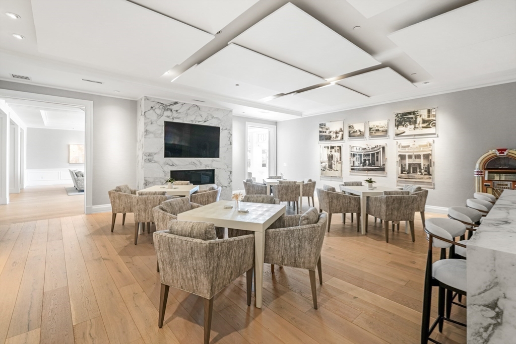 35 Littles Point Road, Unit S201 Swampscott, MA 01907 - Photo 30 of 36 a view of a dining room with furniture window and wooden floor