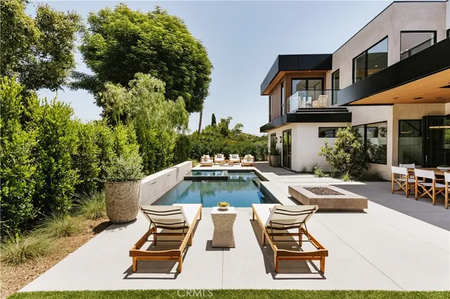 a front view of a house with yard