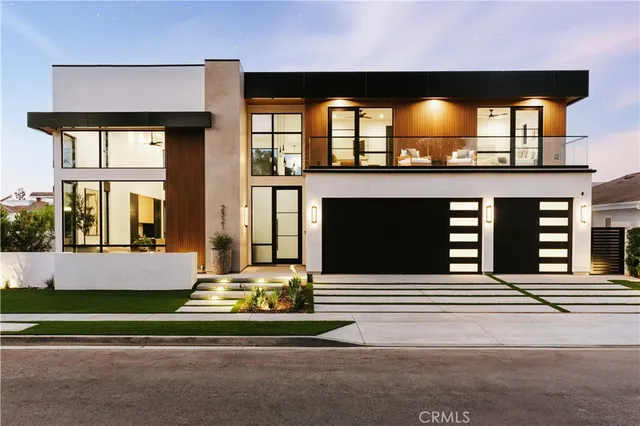 a front view of a house with a garage