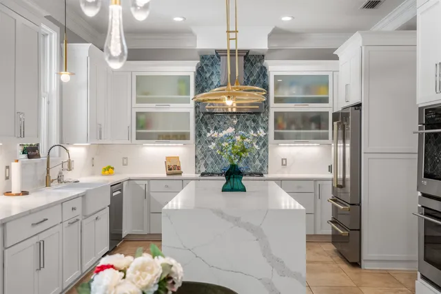 a spacious bathroom with a shower and a sink