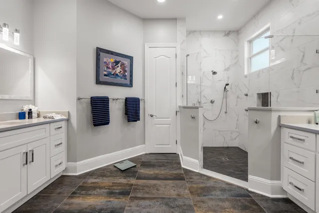 a living room with furniture window and a flat screen tv