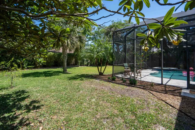 a view of a balcony with furniture