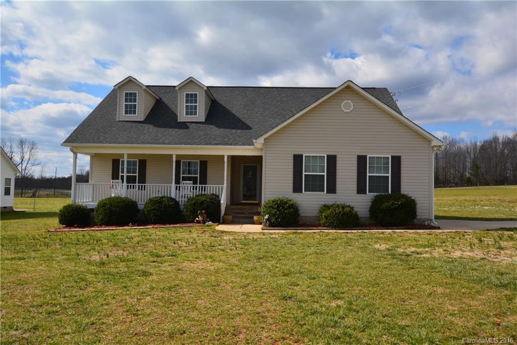 214 Pendergrass Road York, SC 29745 - Photo 1 of 21 a front view of a house with a yard