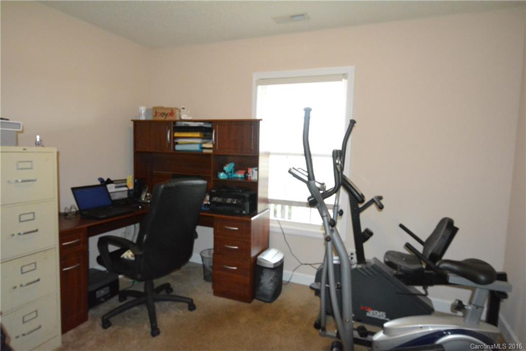 214 Pendergrass Road York, SC 29745 - Photo 11 of 21 a view of a workspace with furniture and a window