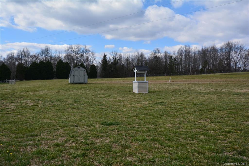214 Pendergrass Road York, SC 29745 - Photo 14 of 21 a backyard of a house with lots of green space