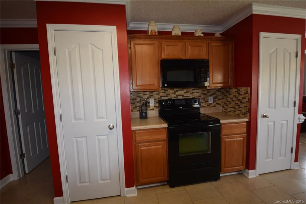 214 Pendergrass Road York, SC 29745 - Photo 18 of 21 a kitchen with a stove and a microwave