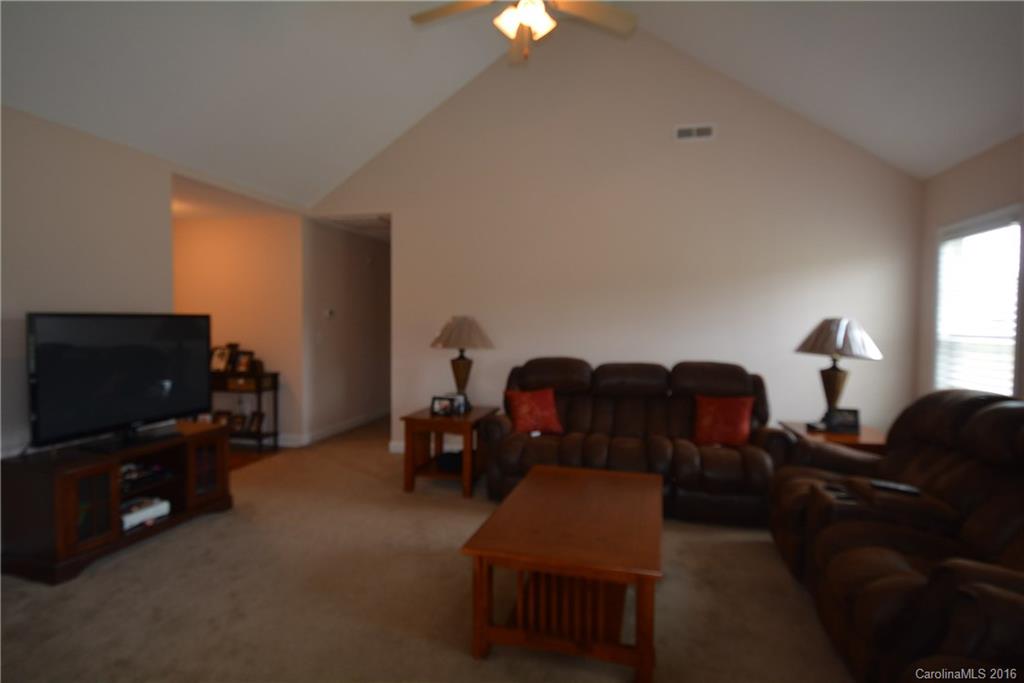 214 Pendergrass Road York, SC 29745 - Photo 20 of 21 a living room with furniture and a flat screen tv