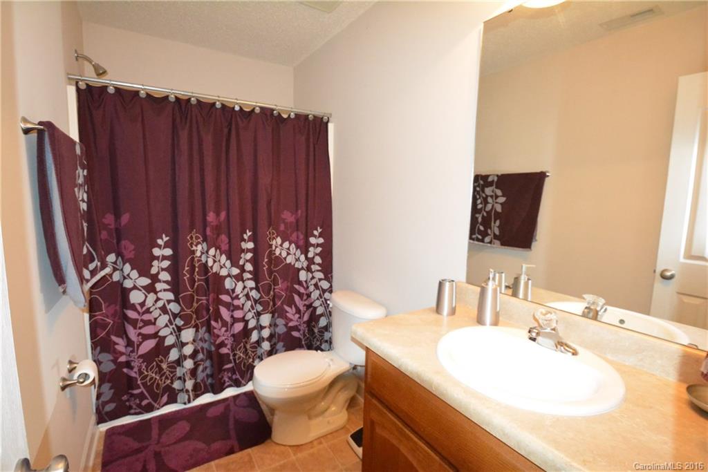 214 Pendergrass Road York, SC 29745 - Photo 21 of 21 a bathroom with a toilet a sink and a mirror