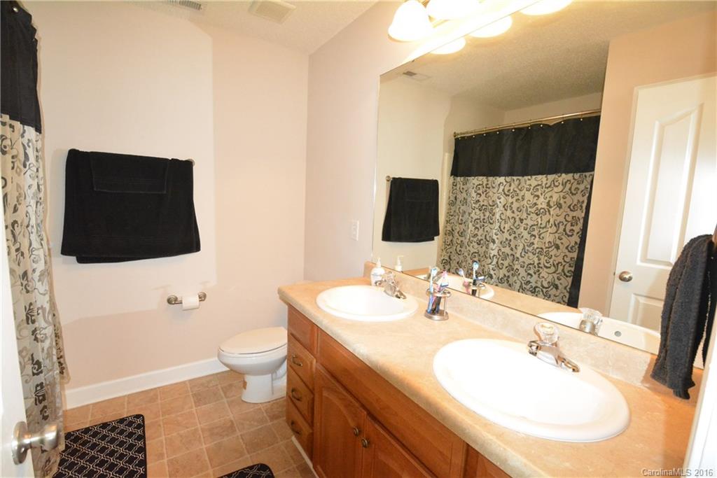 214 Pendergrass Road York, SC 29745 - Photo 9 of 21 a bathroom with a sink toilet and mirror