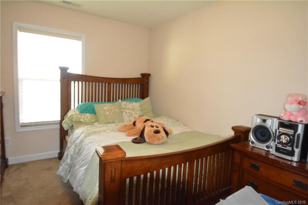 214 Pendergrass Road York, SC 29745 - Photo 10 of 21 a bedroom with a bed and a window