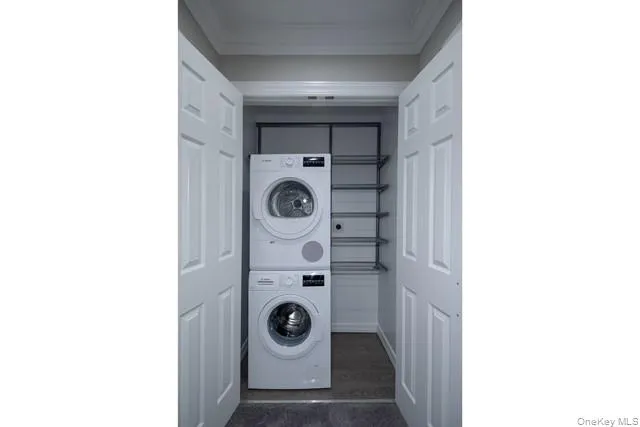 a utility room with dryer and washer