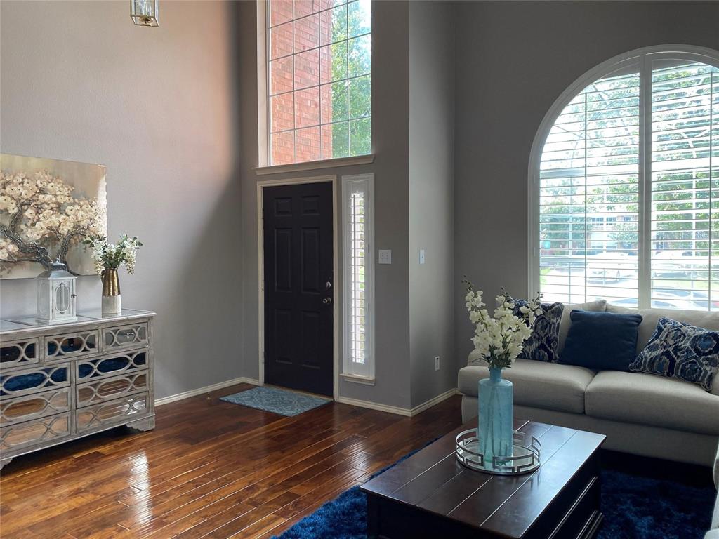 4025 Steepleridge Drive The Colony, TX 75056 - Photo 3 of 23 a living room with furniture and wooden floor