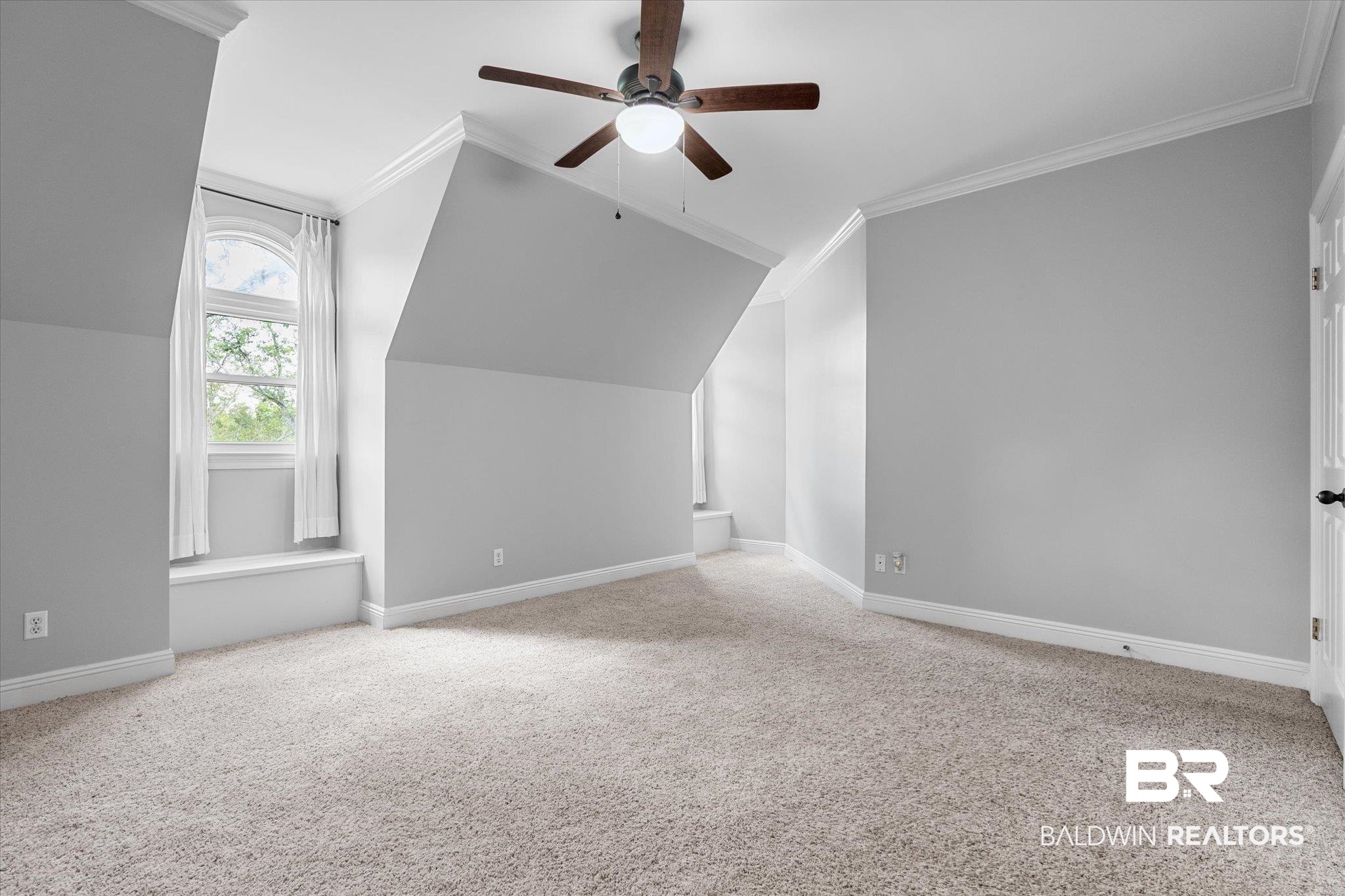 5231 Dawes Road Grand Bay, AL 36541 - Photo 18 of 49 Bonus room with vaulted ceiling, ceiling fan, and light colored carpet