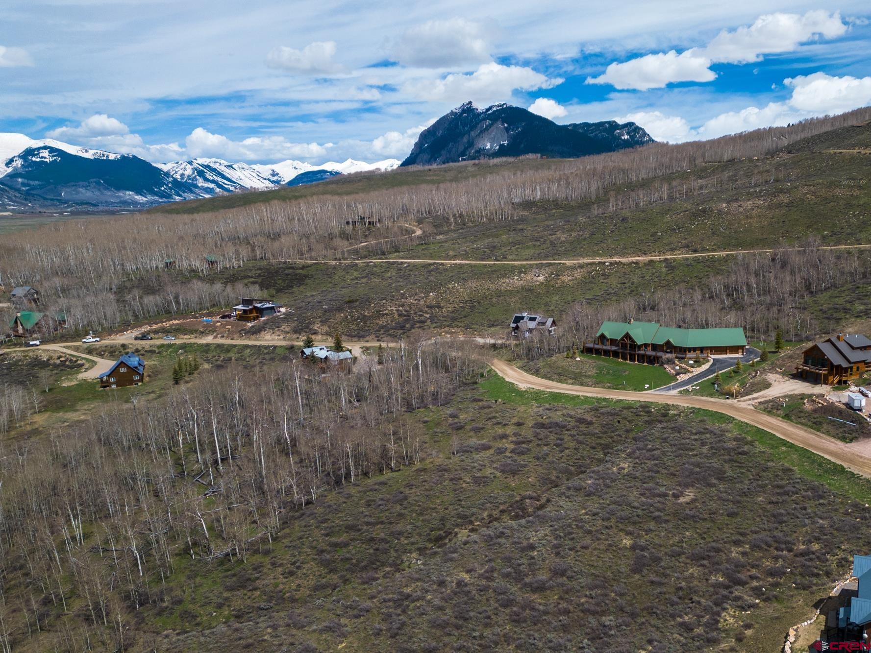 208 Neville Way Crested Butte, CO 81224 - Photo 3 of 12 a view of a lake with a mountain