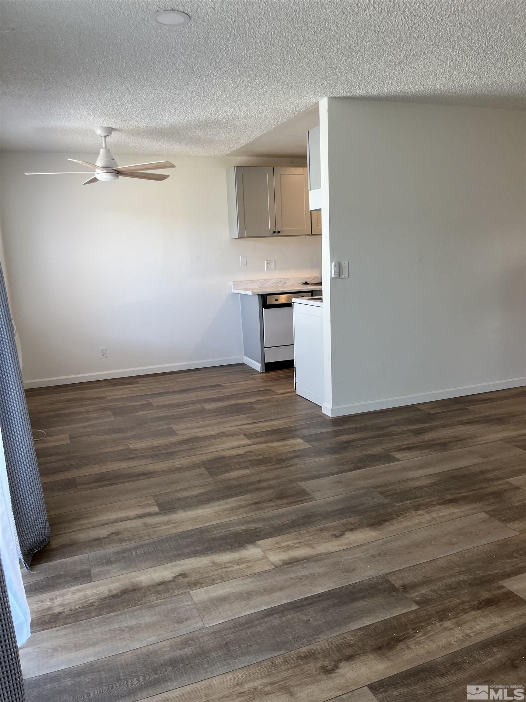 4600 Neil Road, Unit 44 Reno, NV 89502 - Photo 7 of 17 a view of a kitchen with a sink and cabinets