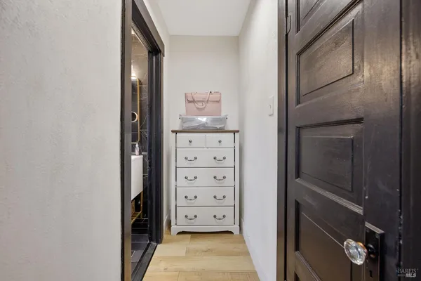 a bathroom with a sink toilet and mirror