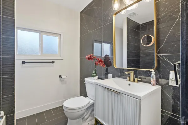 a bathroom with a bathtub and a sink