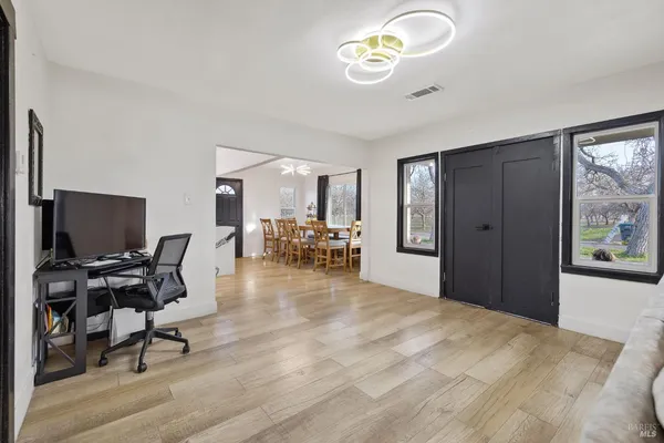 a view of a livingroom with a workspace
