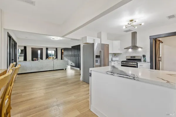 a utility room with a sink dryer and washer