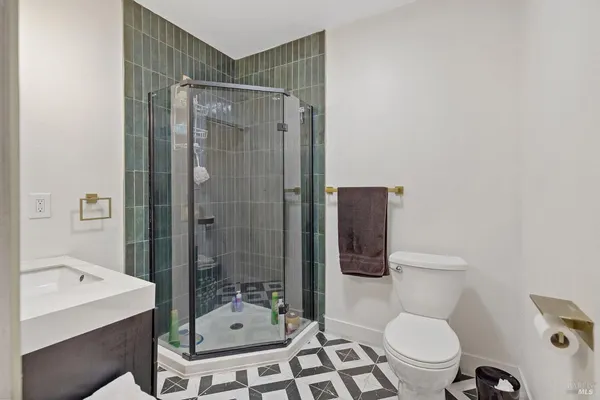 a living room with a bed and a window