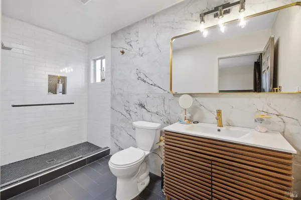 an aerial view of a city with ocean view