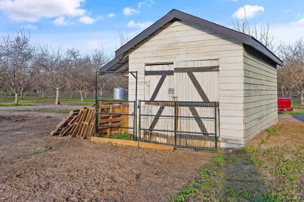 a aerial view of a house with a yard
