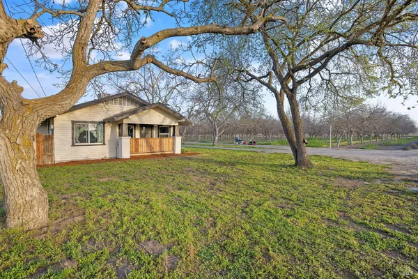 a view of outdoor space with deck and garden