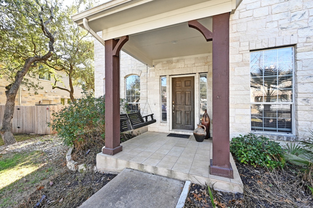 12304 Aralia Ridge Drive Austin, TX 78739 - Photo 4 of 37 a view of a house with a outdoor space