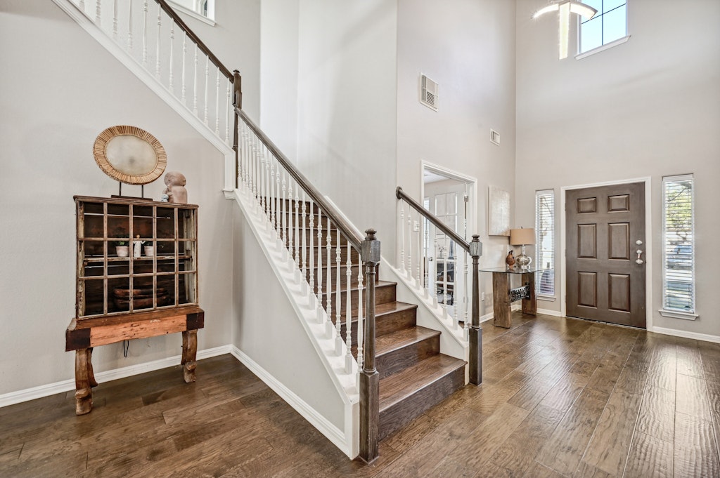 12304 Aralia Ridge Drive Austin, TX 78739 - Photo 5 of 37 a view of entryway and hall with wooden floor