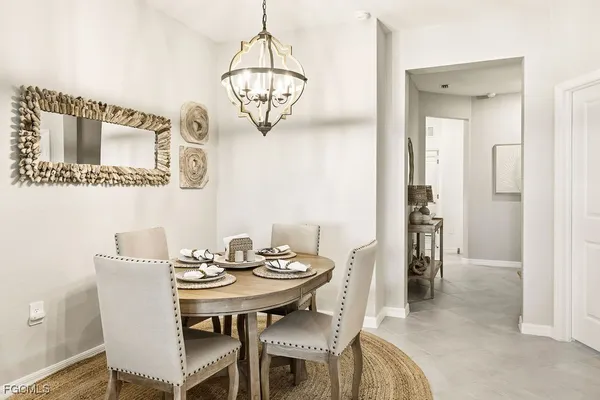 a view of a dining room with furniture